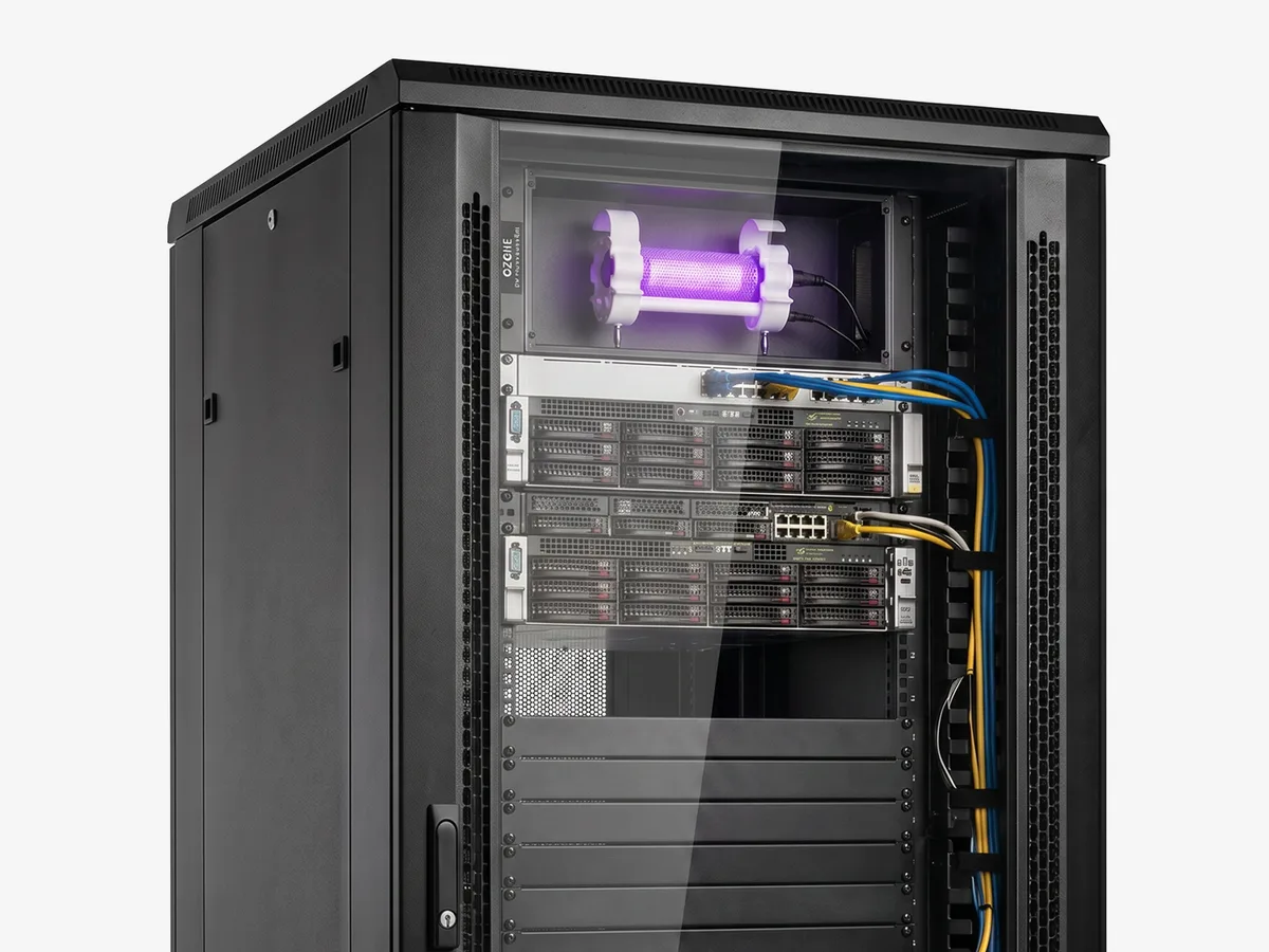 Server rack with a Pür Plasma core glowing violet above the equipment, protecting the hardware